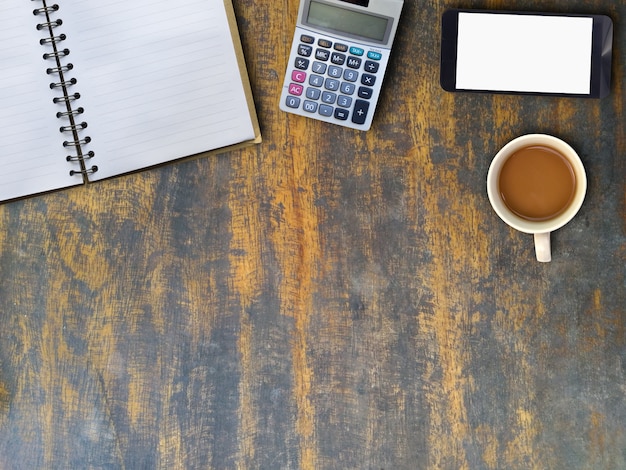 Mock up working table with book and calculator