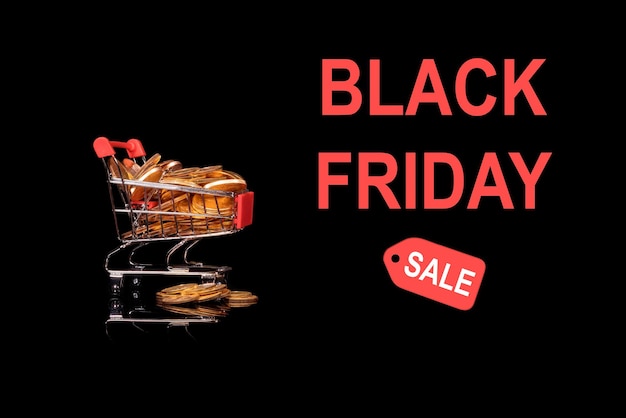 Mockup or background advert for Black Friday with shopping cart filled with gold coins to illustrate savings to be found in the sales