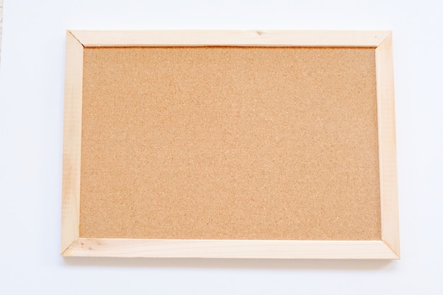 Photo mockup of blank photo frame on white background, simple and minimal style.