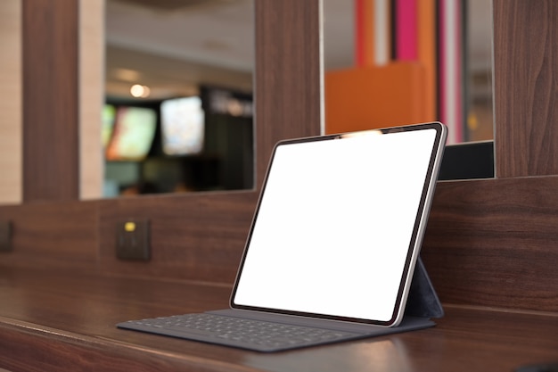 Mockup blank screen tablet in office