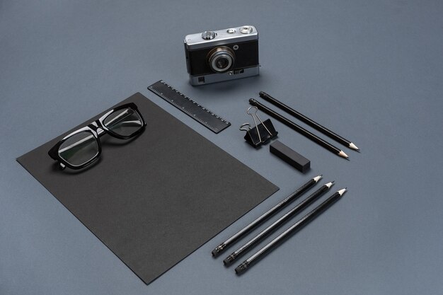 Photo mockup business brand template on gray background. set of black stationery. flat lay. still life.