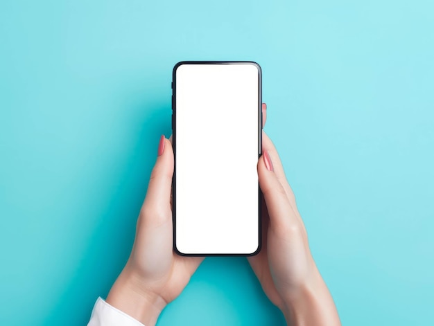 Mockup of a female hands holding a cell phone with blank screen