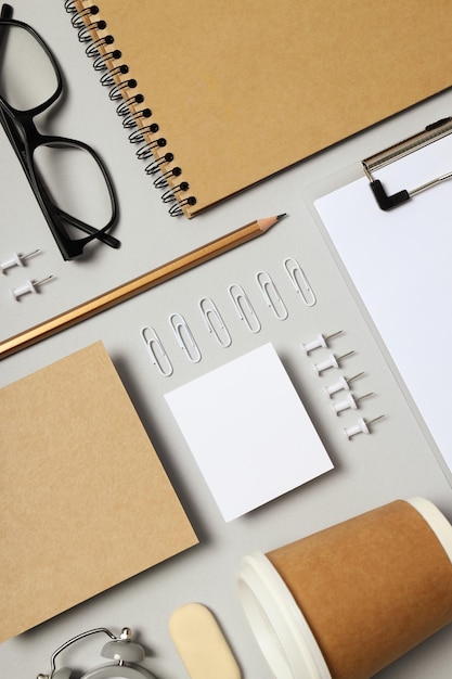 Mockup flat lay with different office accessories on light gray background