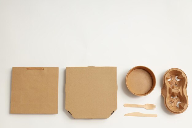 Photo mockup flat lay with food delivery accessories on white background