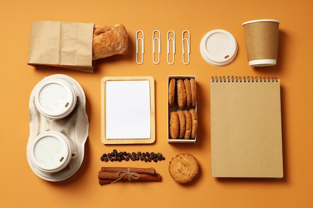 Mockup flat lay with freelancer accessories on beige background