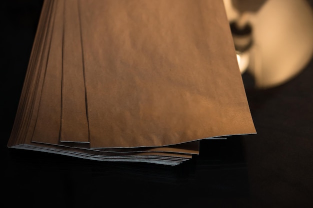 Mockup friendly photo with paper bags in on table in shop Dark background