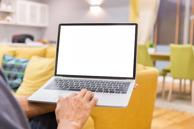 Mockup image of a businessman using laptop.