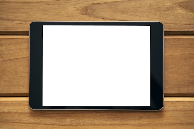 木製のテーブル上のタブレットPCの模擬イメージ