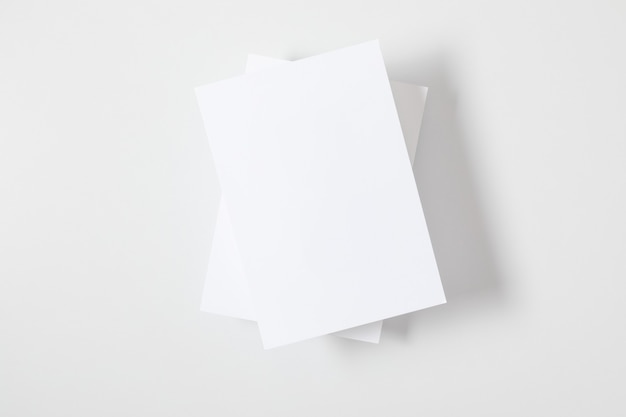 Mockup invitation blank greeting on white background Flat lay top view