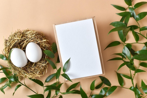A mockup of a kraft envelope with a white sheet of paper and eggs EcoEaster Zero waste Lifestyle without plastic Flat layout top view place to copy