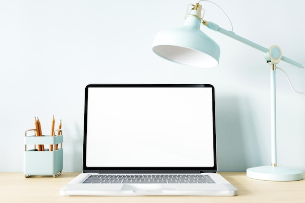 Mockup of laptop computer and blank laptop screen mockup on desk