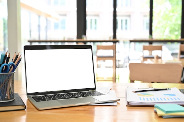 Premium Photo | Mockup laptop computer on business office desk.