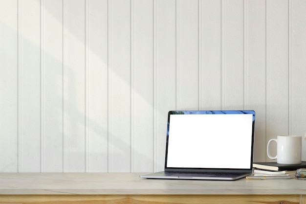 Mockup laptop on desk workspace and copy space. Blank screen laptop