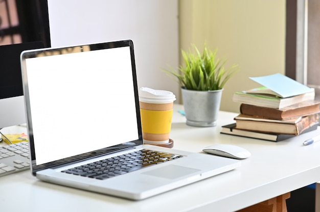 Mockup of laptop on office desk