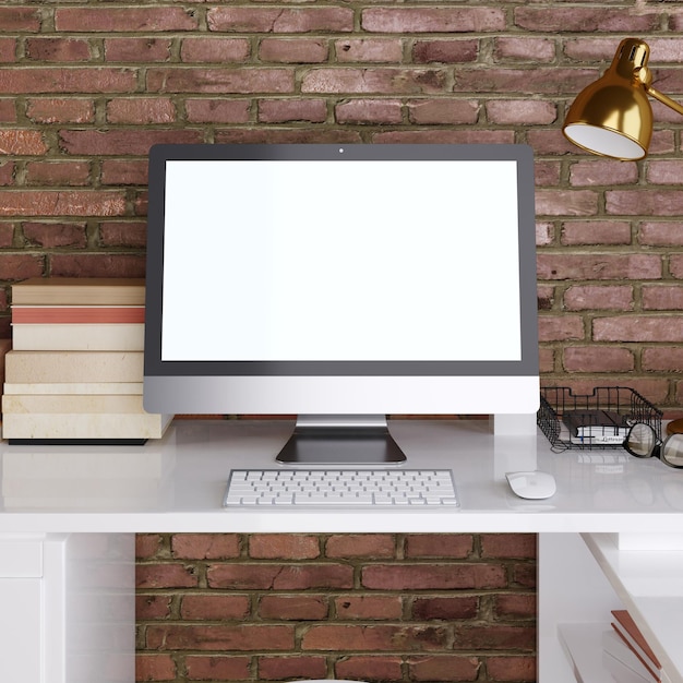 Макет монитора на белом фоне рабочего стола на стене из красного кирпича 3D рендеринг