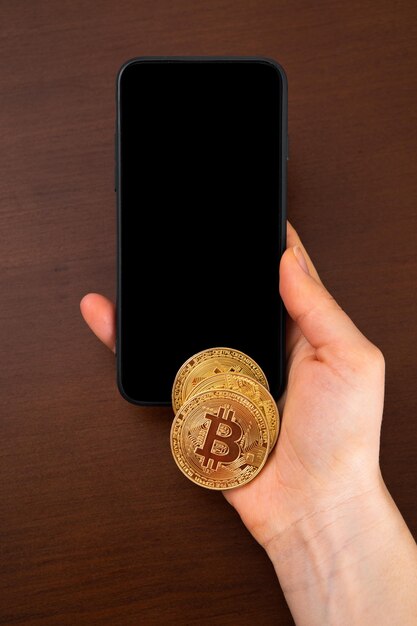 Mockup pay with bitcoin woman with mobile phone