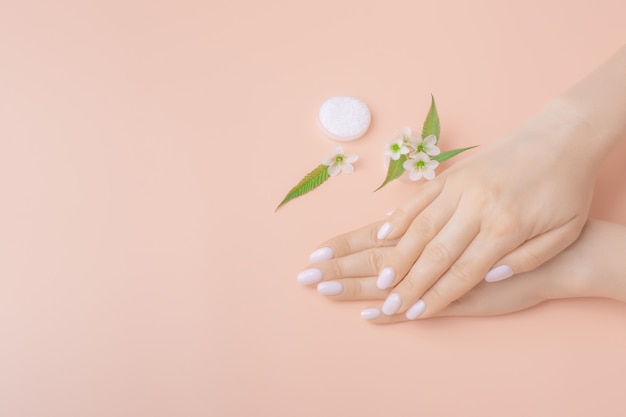 Mockup skin care hands. Hands of woman with palms down. hand care concept. copyspace