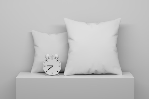 Modello mockup con due cuscini e orologio su supporto di base nei colori bianco