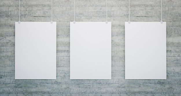 Mockup of three blank white posters hanging on a brick wall\
promotion and advertising concept 3d render