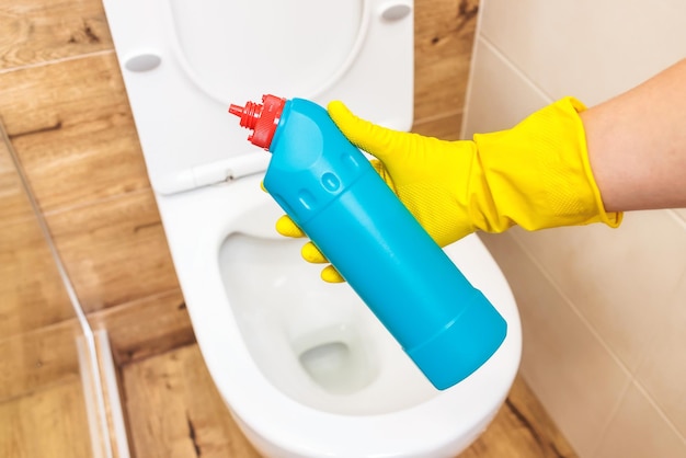 Mockup toilet cleaner blue bottle of liquid product with place for label