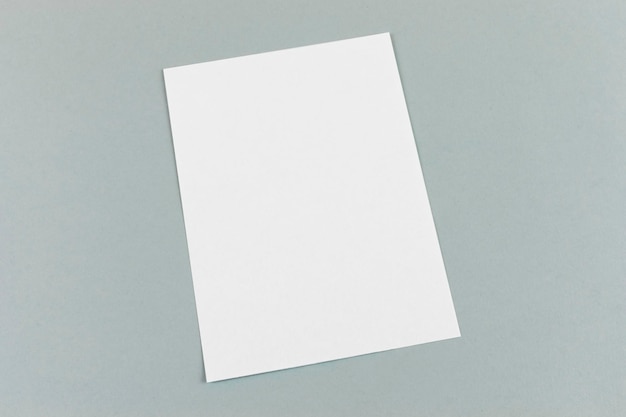 Mockup of white blank empty page for invitation documents card branding on grey background