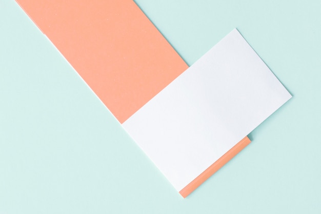 Pastel-Colored Paper Cut Background Graphic by Mhek Creatives