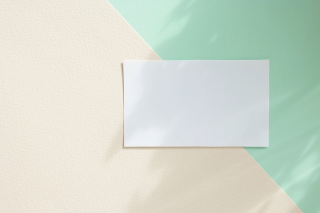 Mockup of a white paper card on pastel background