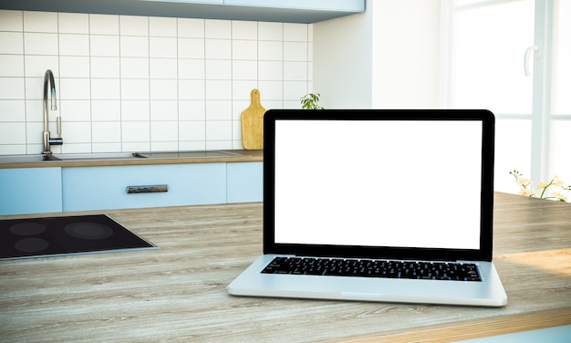 Mockup of white screen laptop on cooking island at kitchen