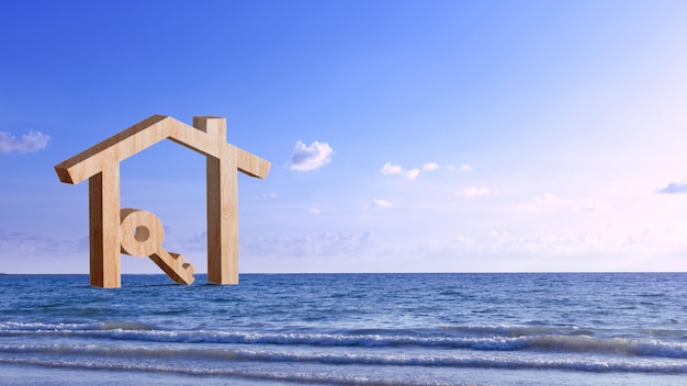 Mockup casa in legno e chiave sul concetto di sfondo del mare di investimenti immobiliari pianificazione del risparmio di denaro delle monete acquistare concetto di casa per mutui immobiliari e investimenti immobiliari