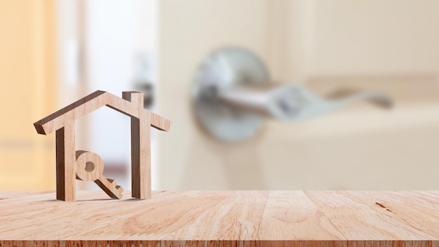 Mockup wooden house and key on wooden table concept of real estate investment Planning savings money of coins buy home concept for property mortgage and real estate investment