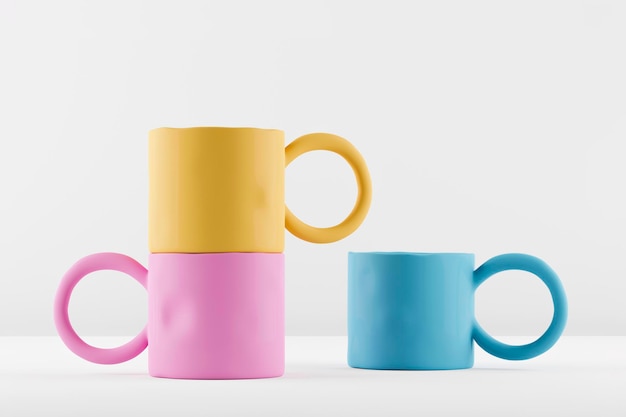 Макеты трех разноцветных глиняных чашек ручной работы на белом фоне