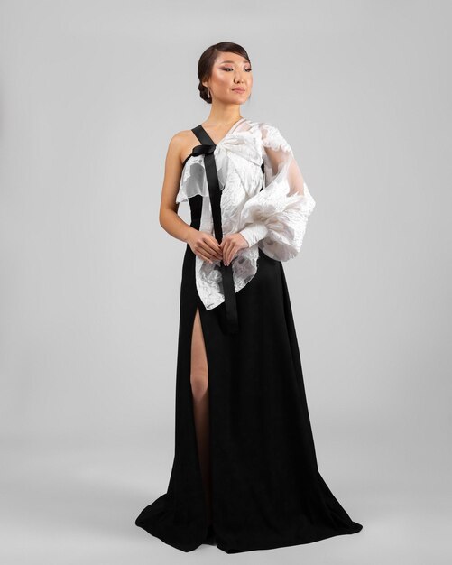 A model in an elegant evening dress dress