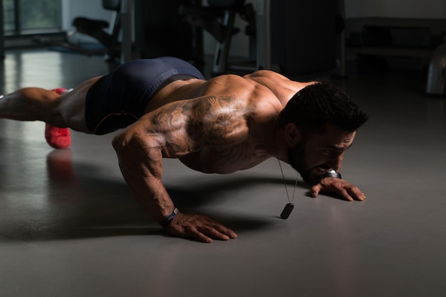 Model Exercising Push Ups