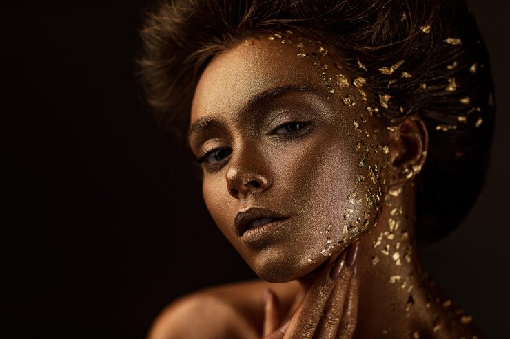 model girl with holiday golden shiny professional makeup