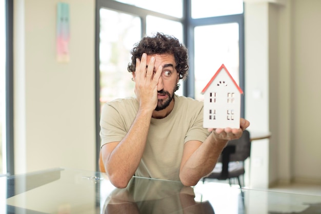 Model holding a house home concept