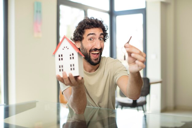 Model holding a house home concept