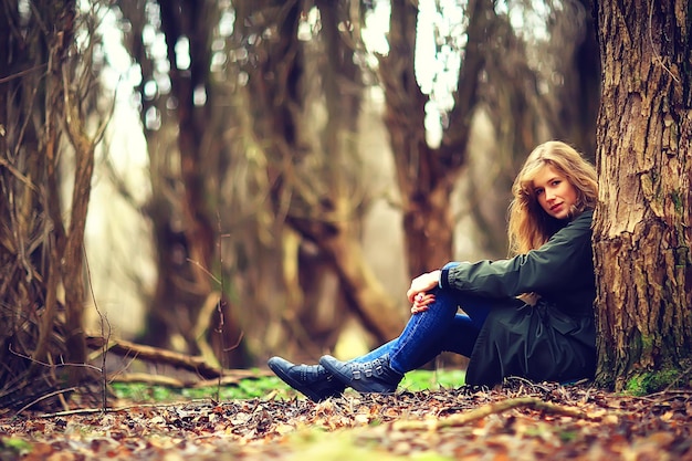 model late autumn in the park, european style adult girl in seasonal glamorous look