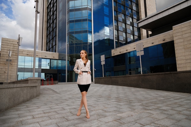 Model in office clothes in the street