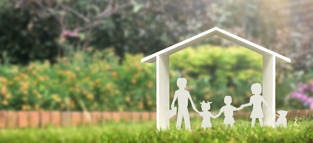 Model paper house cut out with family