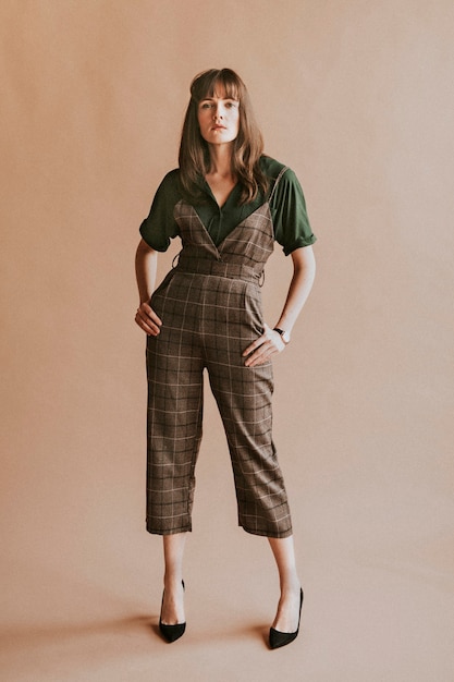 Model in a plaid jumpsuit