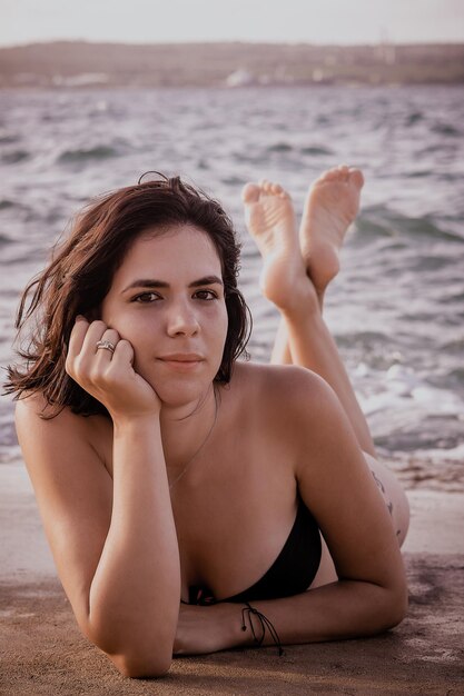 model posing in a fashion session in a park