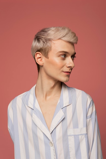 Photo model posing with pink background