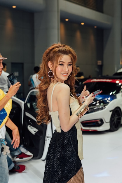 Model pretty lady beauty and sexy on display in car show event