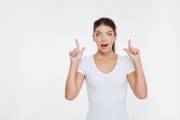 Photo model showing up in studio isolated white wall