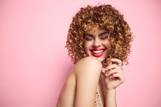 Model Smile curly hair red lips fun bright makeup