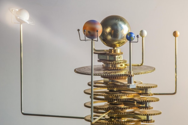 Model of the solar system made of brass closeup