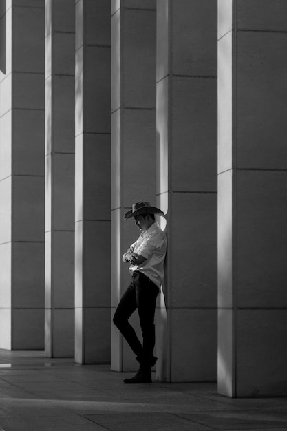 Photo model wearing the a hat standing