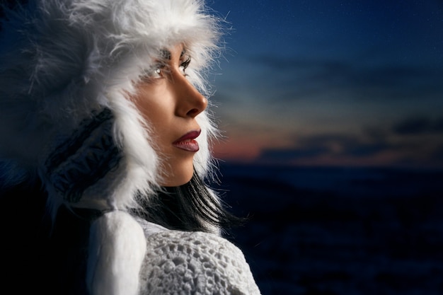 Model in winter white hat 