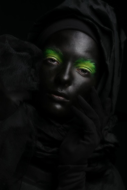 Model with black face