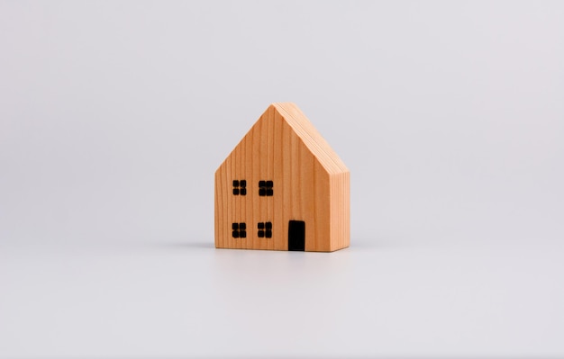 Photo model wooden house toy house first house project and home loan and housing